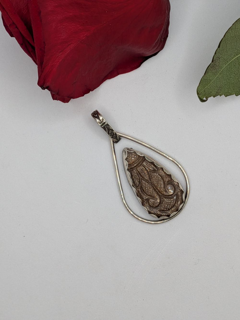 Carved Peach Sunstone Pendant 